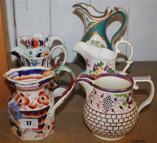 6 variously decorated jugs